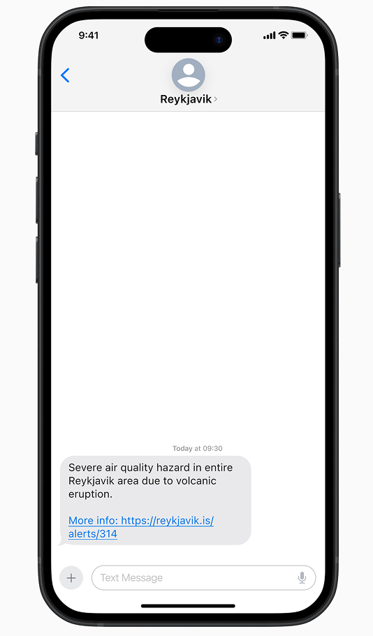 SMS alert on a phone with concise actionable information and a link to more detail